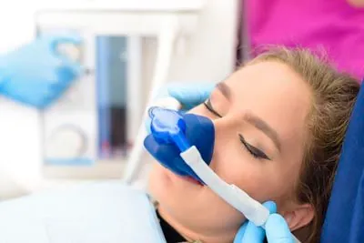 woman asleep during her dental procedure